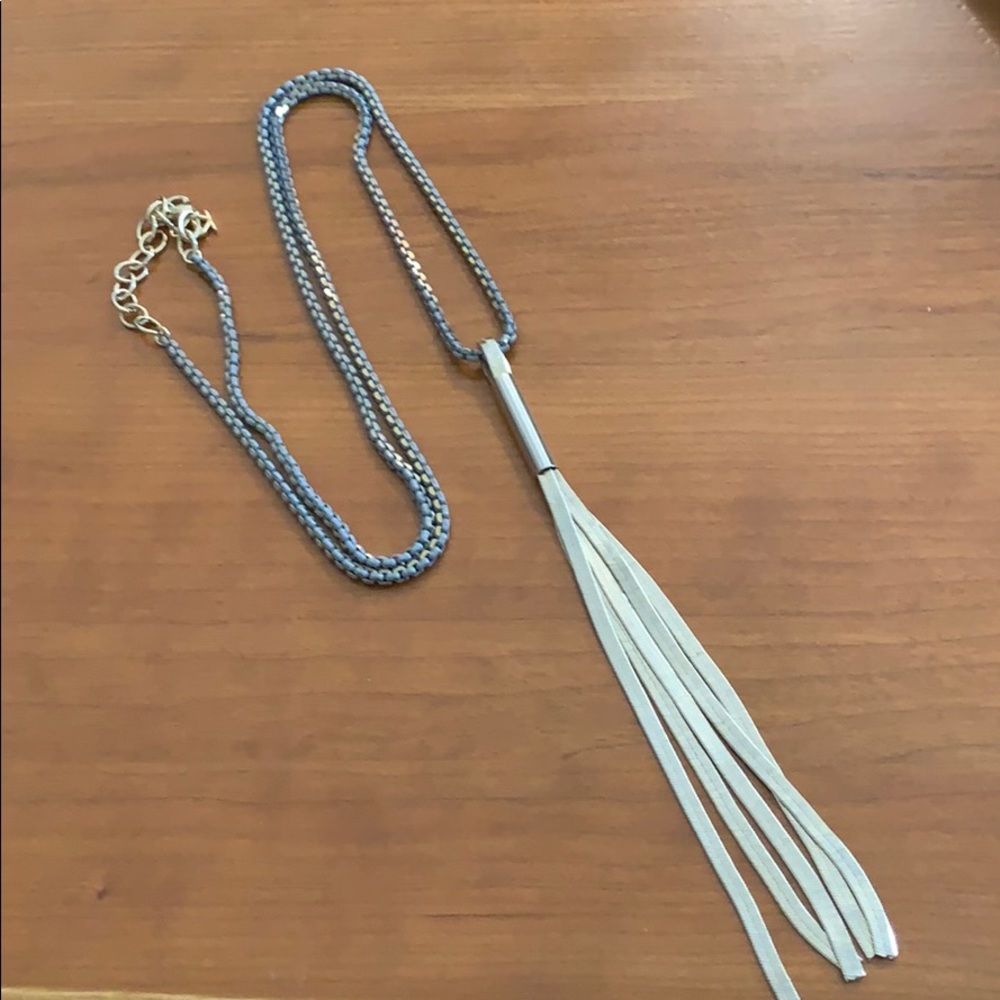 Gray chain with gold tassel